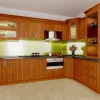 Tủ bếp gỗ Xoan Đào tự nhiên 100% kiểu chữ L màu cánh gián